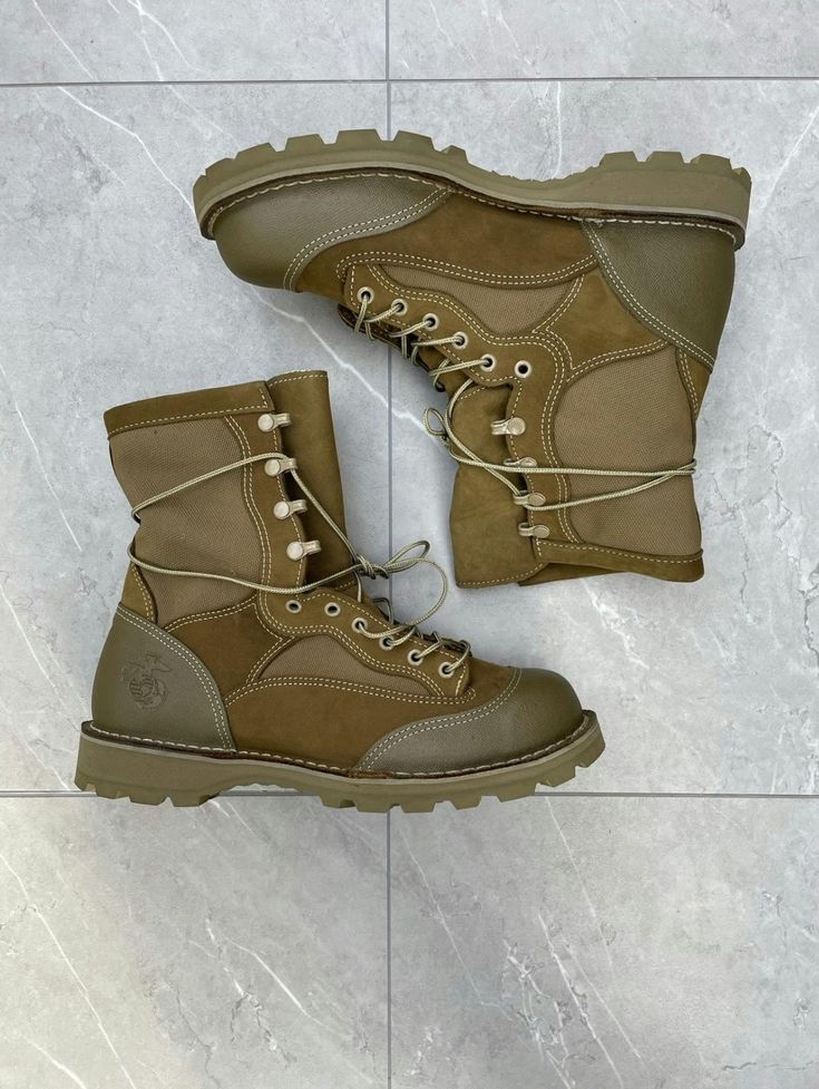 "Vintage Military Tan Desert Combat Boots  Color: Tan   Constructed of high-quality Nubuck leather/1000 nylon upper 8\" Height shaft, flat collar slip-resistant Rated for temperatures between 65oF - 27 oF USMC EGA emblem on the outer side of each heel Please note all items are examined to the best of our ability. Most items are 20+ years old and are not in perfect condition small imperfections are to be expected any major flaws will be disclosed.  No major flaws Condition:9/10 MESSAGE WITH OFFERS AND QUESTIONS  NO RETURNS  FOLLOW OUR PAGE FOR DAILY HEAT NEW ITEMS DROP DAILY!" Desert Combat Boots, Canadian Military, Brand Aesthetic, Flat Collar, Boots Casual, Military Boots, Vintage Military, Cool Boots, Nubuck Leather