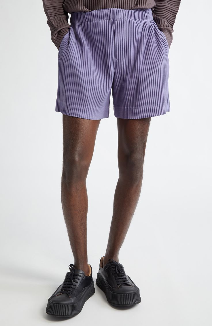 Simple in silhouette, sophisticated in technique—these relaxed shorts feature Issey Miyake's signature garment pleating for a wrinkle-resistant finish. Elastic waist 100% polyester Machine wash, dry flat Made in Japan Designer Clothing Asian & Pacific Islander Owned/Founded Relaxed Fit Pleated Shorts, Relaxed Pleated Shorts, Relaxed Fit Pleated Short Bottoms, Pleated Relaxed Fit Short Bottoms, Pleated Relaxed Fit Shorts, Modern Pleated Bottoms For Summer, Pacific Islander, Pleated Shorts, Issey Miyake