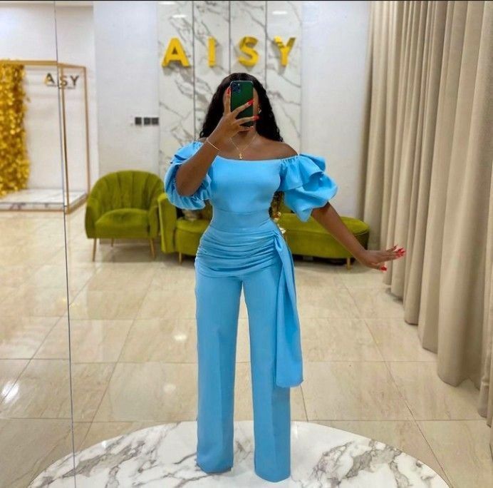 women's flounce Puff sleeve jumpsuit in 2022 | Fashion top outfits, Stylish women fashion, Classy casual outfits Blue Graduation Outfit Ideas, Graduation Clothes Outfits Women, Palazzo Jumpsuit Outfit Classy, Classy Jumpsuit Outfits Casual, Plain Material Styles For Ladies, Convocation Dress Graduation, Blue Classy Dress, Two Pieces Trouser And Top, Jumpsuit Elegant Chic