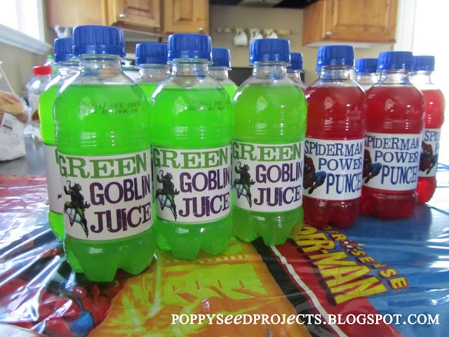 several bottles of juice sitting on top of a table