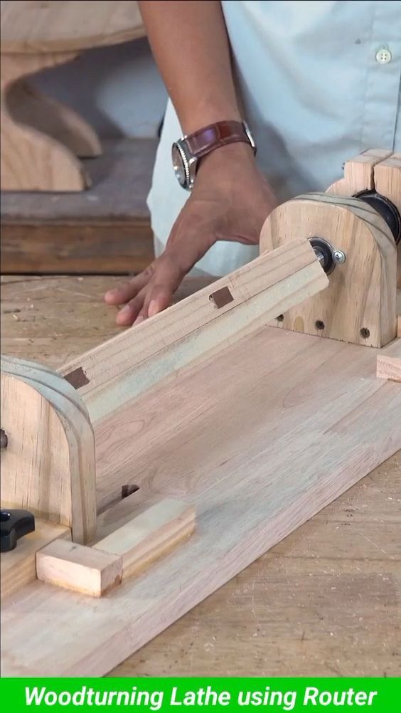 a person working with woodturning lathe using router