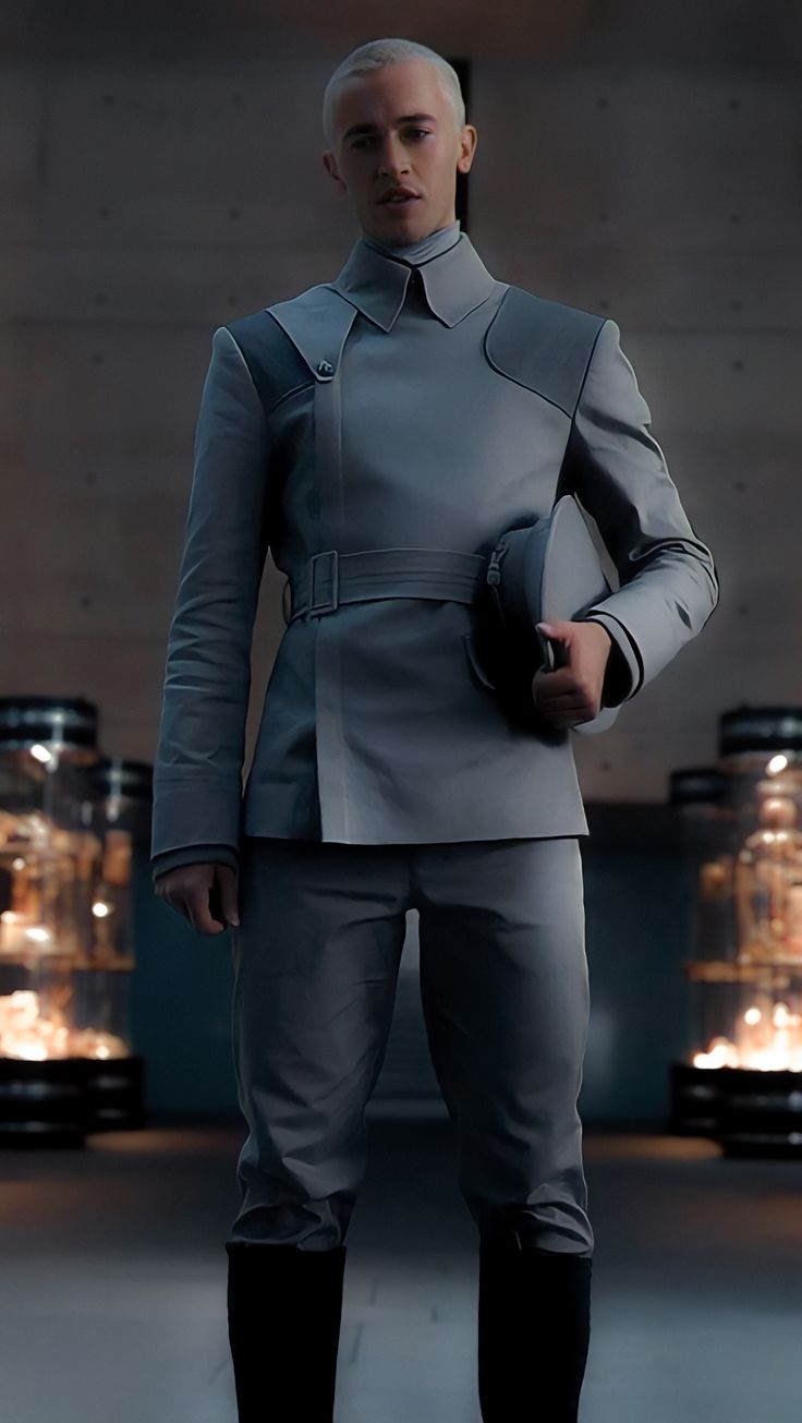 a man in a star trek uniform standing with his hands on his hips