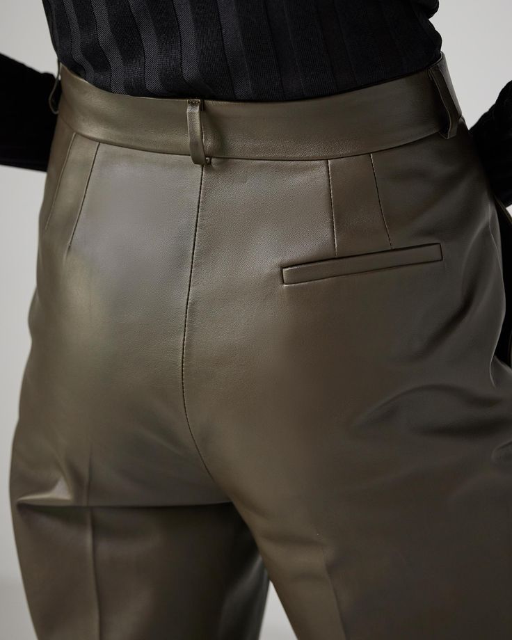 High-waist wide leg trousers in supple nappa leather with front slash pockets, back welt pockets, and hidden waistband closure. Modern Leather Trousers For Work, High-waisted Leather Pants For Work, Leather Office Bottoms With Pockets, Modern Leather Bottoms For Business Casual, Leather Bottoms With Pockets For Office, Modern Leather Pants With Pockets For Work, Office Leather Bottoms With Pockets, Modern Straight Leather Pants For Workwear, Sleek Leather Pants With Belt Loops For Work