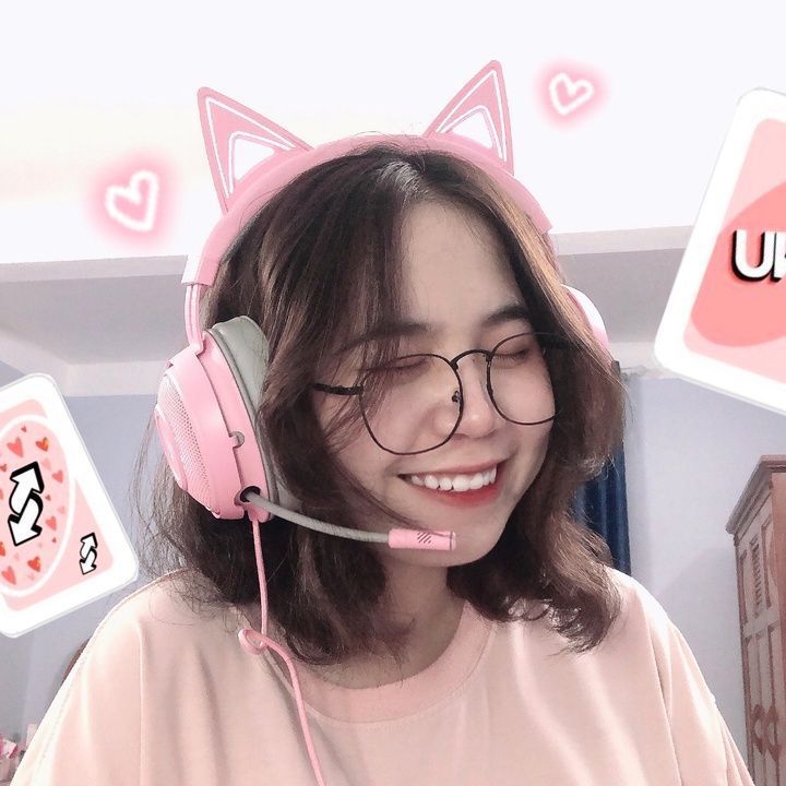 a woman wearing pink headphones with cat ears on her face and the caption, i love u