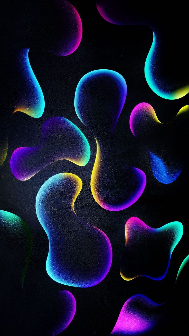 an image of colorful shapes on a black background that looks like liquid or gas bubbles