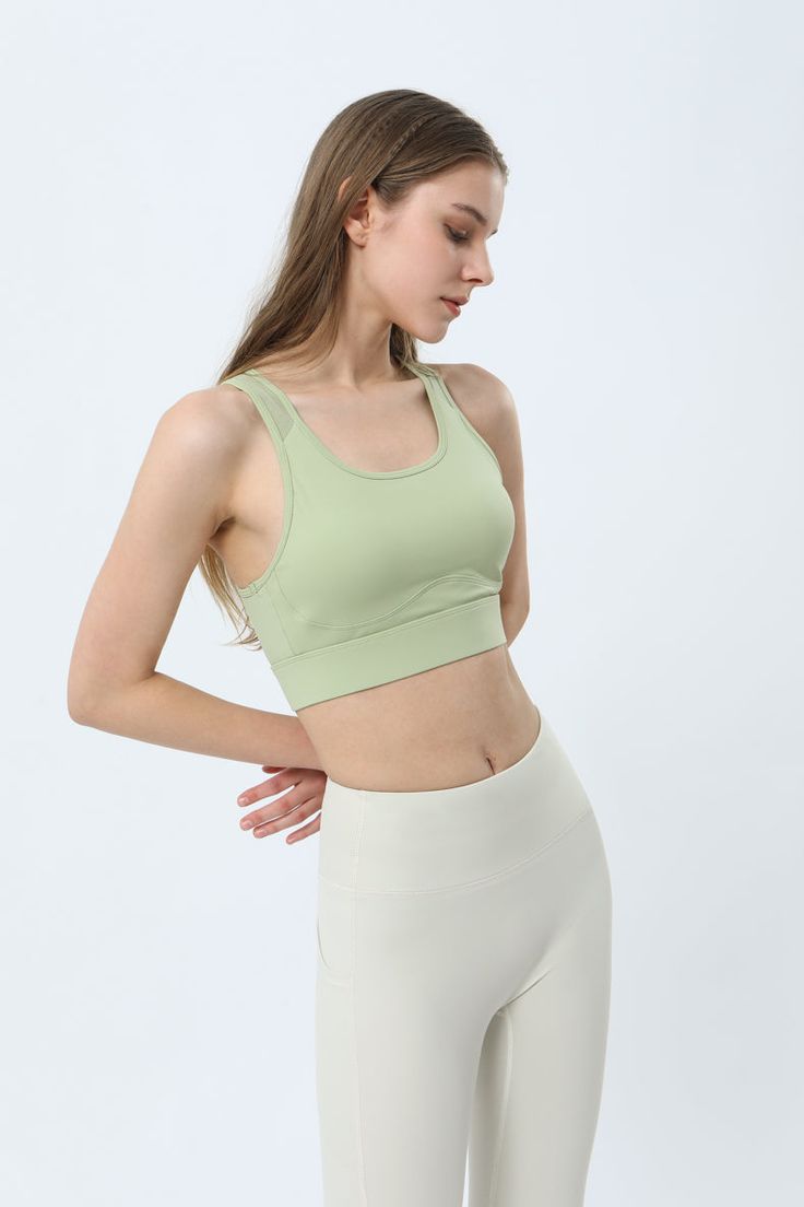 75% Nylon . 25% Spandex Soft. comfortable. skin friendly 4-way stretch. breathable and sweat-wicking Built-in Bra with Removable Pads Light. breathable mesh promotes cooling ventilation Cut-out design provides a breezy feel and stylish look Adjustable buckle designs for easy customization and comfortable wear Perfect for both sports activities and daily life Supportive Activewear With Built-in Padding For Light Sports, Functional Summer Activewear With Built-in Padding, Breathable Activewear For Light Exercise During Sports Season, Green Sports Bra With Light Support And 4-way Stretch, Casual Activewear With Built-in Padding And 4-way Stretch, Breathable Functional Sports Bra For Light Sports, Green Sports Bra With Light Support, Green Breathable Sports Bra, Solid Sports Bra With Built-in Padding And 4-way Stretch