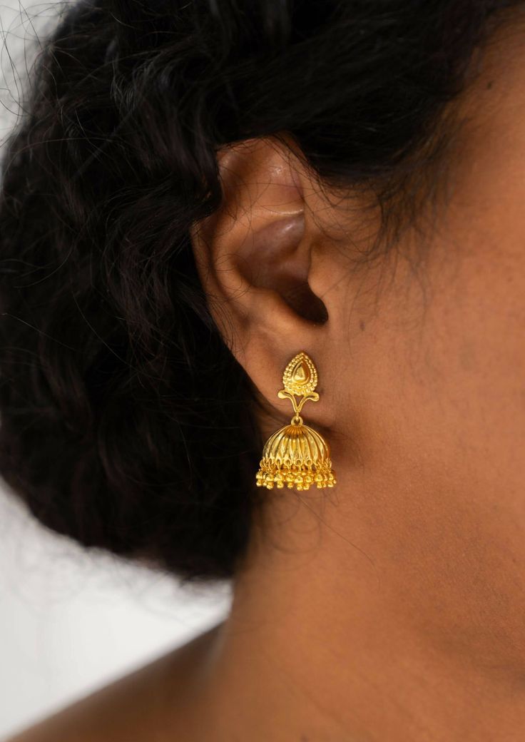 Your mom wore them, your grandma wore them, your great grandma wore them. There’s no disputing that the jhumka is timeless. Introducing devi, a modern take on the classic jhumka, that honors the past while creating a new tradition that is true to the south asian diaspora. Devi is a symbol of our personal connection to the people who have adorned jhumkas for centuries. Crafted with the highest attention to detail, devi is a modern heirloom designed to be cherished and passed down through generati Traditional Jhumkas For Festive Occasions, Heavy Jhumkas For Festive Occasions, Bollywood Style Intricate Design Jhumkas, Elegant Jhumkas For Diwali, Ceremonial Jhumkas For Diwali, Ceremonial Latkans Earrings, Gold Bollywood Style Jhumkas, Temple Jewelry Style Jhumkas With Latkans, Gold Ceremonial Jhumkas