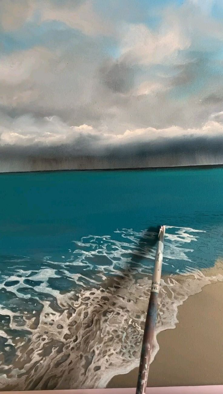 an oil painting of the ocean with waves coming in to shore and clouds above it