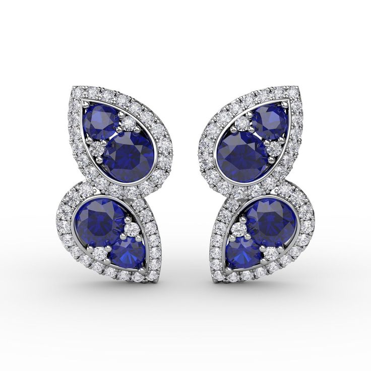 14K White Gold 8 Sapphires = 1.72ctw. 74 Round Brilliant-cut Diamonds = 0.46ctw., H-I/VS2-SI1 The earrings measure 17mm tall and 11mm wide. Luxury Sapphire Diamond Earrings With Round Cut, Luxury Round Sapphire Diamond Earrings, Luxury Blue Diamond Cut Earrings, Luxury Sapphire Gemstone Diamond Earrings, Luxury Sapphire Round Cut Earrings, Luxury Blue Brilliant Cut Diamond Earrings, Luxury Sapphire Earrings With Polished Finish, Luxury Sapphire Diamond Earrings For Engagement, Luxury Sapphire Diamond Earrings As Gift