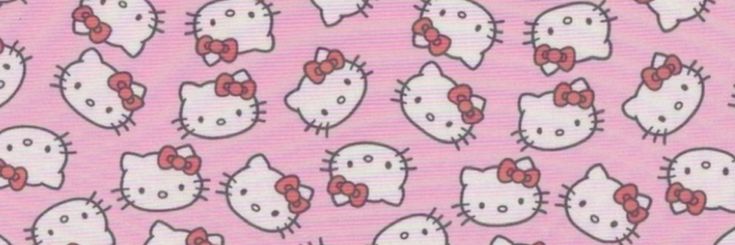 a pink background with hello kitty heads on it