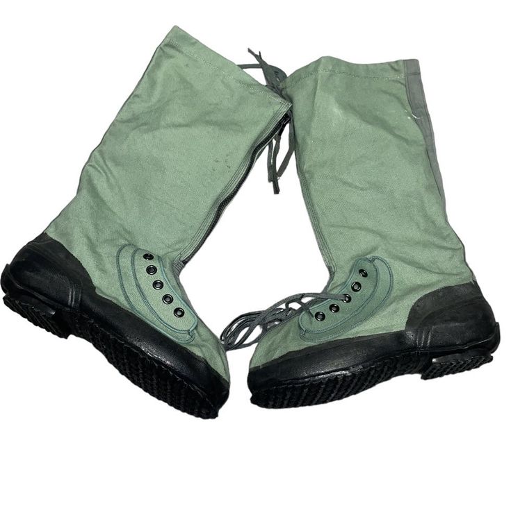 Extreme Cold Weather Mukluk Boots  -Size: Small/ Large is designed to fit U.S. Mens 8-9 boot size -Designed for wear in extreme cold climates to -45 degrees -Eyelet and zipper lacing system -Cotton duck upper fabric material -Polyurethane sole construction protects from ice and water -Sole also provides protection from slipping Laces included If You have any questions regarding sizing, or any questions at all, feel free to reach out !! Green Insulated Waterproof Boots For Winter, Insulated Green Winter Boots, Green Winter Boots For Outdoor Use, Green High-top Combat Boots For Outdoor, Combat Boots For Winter Outdoor Activities, Winter Combat Style Waterproof Hiking Boots, Military Style Waterproof Hiking Boots, Winter Combat High-top Waterproof Boots, Military Style Winter Boots For Outdoor