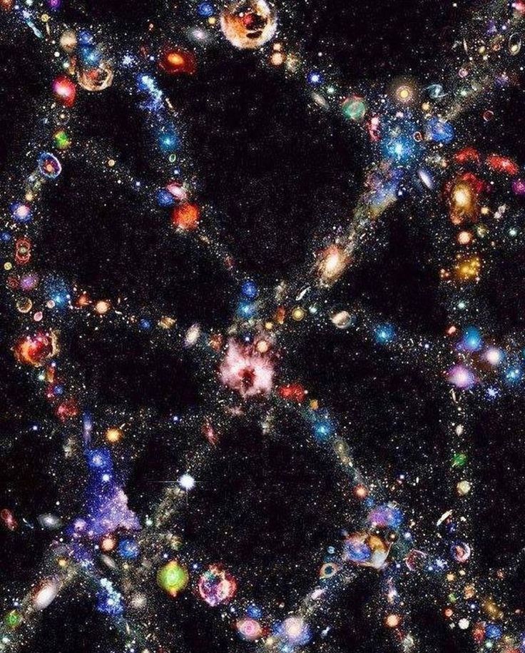 an image of many different colored objects in the dark sky with stars and planets all around it