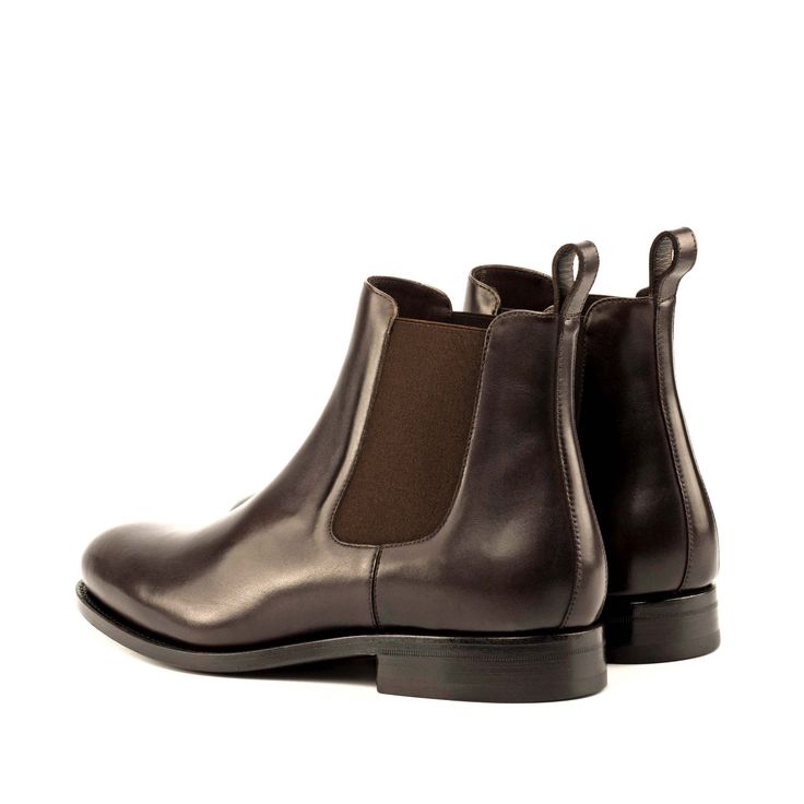 Year after year, Chelsea boots remain one of the most sought-after styles for men. Chelseas can be used in formal attire and casual wear alike, providing a sleek, polished look. This slip-on boot has been a classic for years. The Details: Materials: dark brown box calf Sole: brown Goodyear leather sole plain Last: Zurigo - Rounded toe for fraditional English Look What is Fast Lane? Fast lane is our new experimental 7 day made to order collection, an ambitious never been heard of before collectio Men Dress Boots, Luxury Classic Men's Chelsea Boots, Luxury Masculine Goodyear Welted Chelsea Boots, Men's Luxury Plain Toe Chelsea Boots, Luxury Lace-up Chelsea Boots For Men, Luxury Men's Semi-formal Chelsea Boots, Mens Dress Boots, Brown Box, Dress Boots