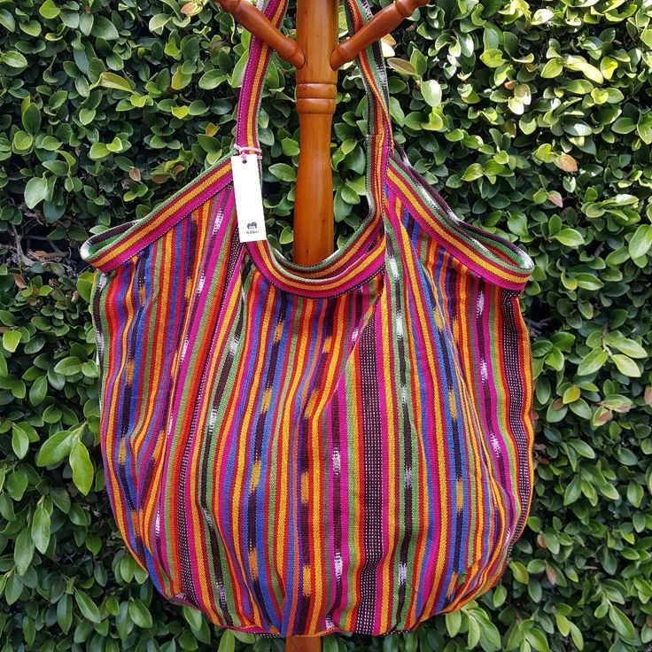 Bnwt Beach Bag This Lightweight Carry-All Hobo Bag Has Been Handcrafted In Guatemala With 100% Cotton "Corte". Perfect For Everyday Use Or A Sunny Day At The Beach! Details Made In Guatemala 100% Cotton Dimensions 14” H, 23” W, 23” D. 10" Shoulder Strap Care Machine Washable With Like Colors. * The Bags Have Been Dyed Manually, You Will See Some Color Bleed. Vibrant Rectangular Summer Bags, Bohemian Multicolor Bucket Bag For Beach, Multicolor Satchel Hobo Bag For Vacation, Vibrant Multicolor Summer Bags, Colorful Vibrant Travel Bags, Vibrant Multicolor Bags For Summer, Vibrant Beach Bags, Multicolor Beach Shoulder Bag With Handles, Multicolor Hobo Tote Bag For Beach