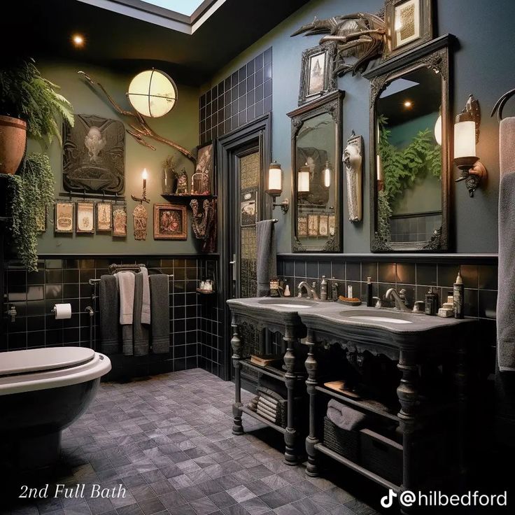 a bathroom with green walls and black tile flooring, two sinks on either side of the bathtub