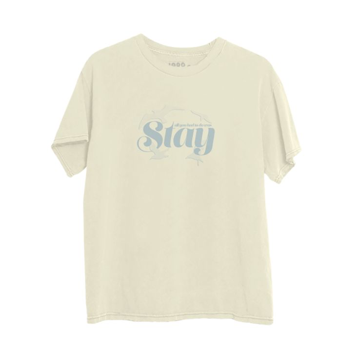 a white t - shirt with the word stay printed on it