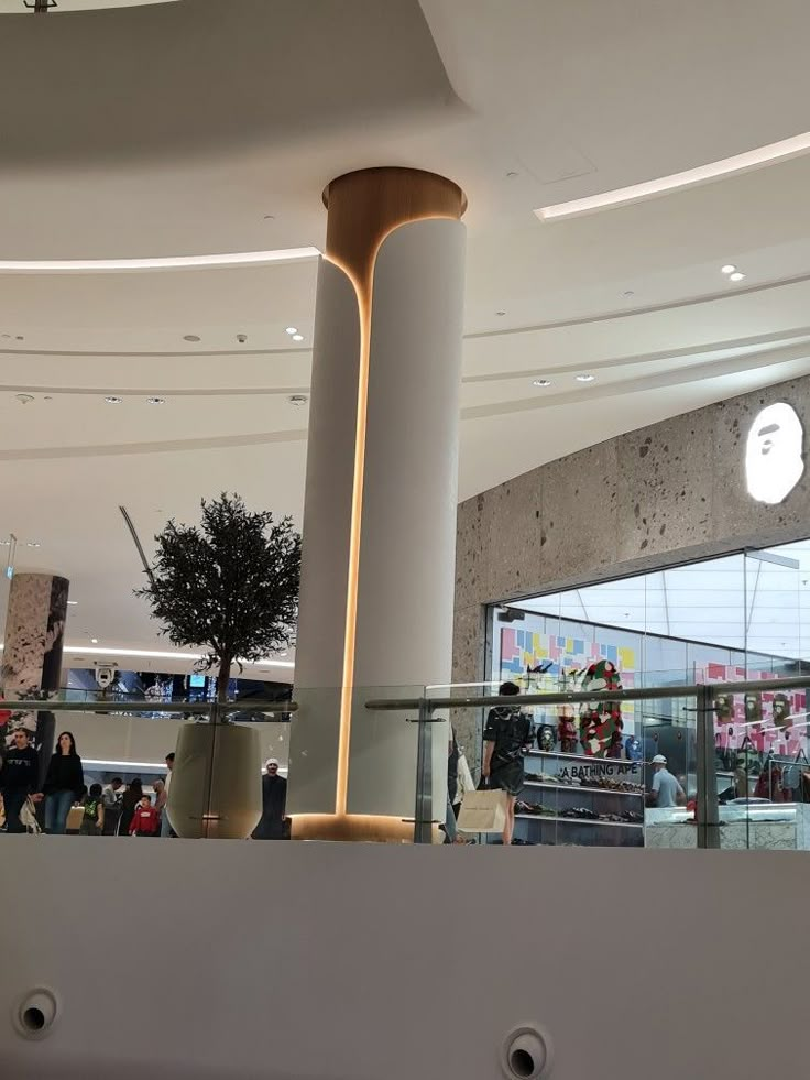 an apple store with people shopping in the background