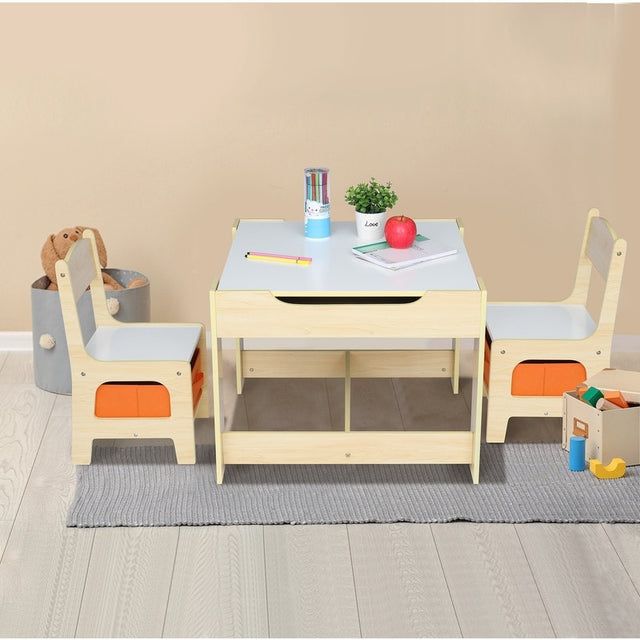 a child's table and chairs set up on the floor