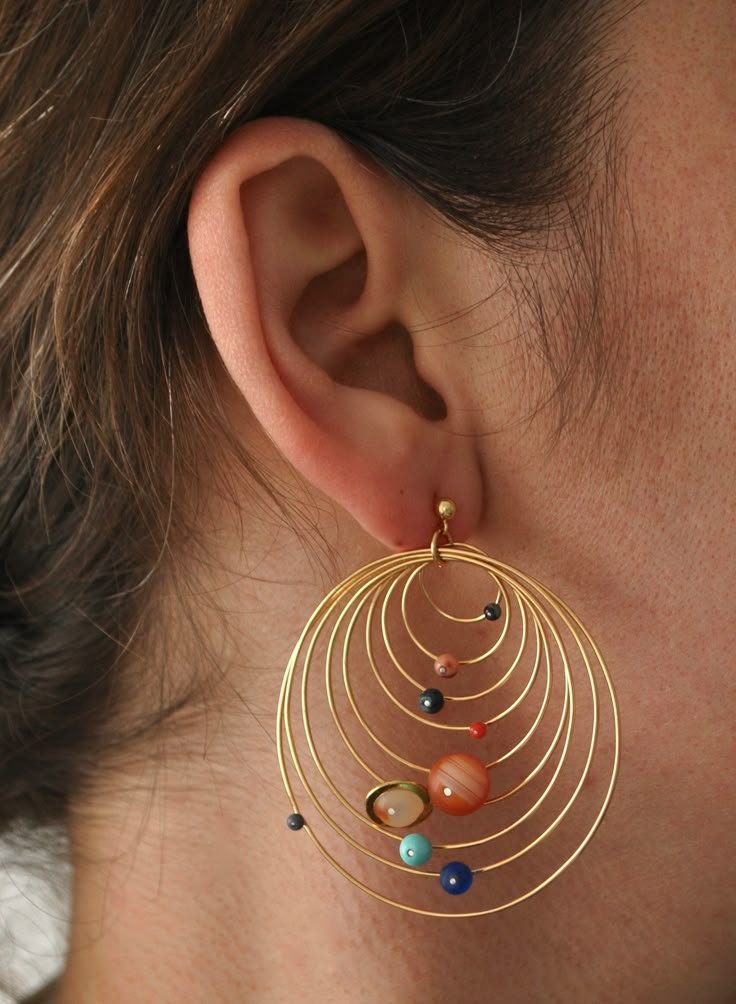 a pair of beautiful handmade solar system earrings  made of gold plated sterling silver and stone beads  bright and noticeable but yet lightweight  the largest hoop diameter is 4 cm Funky Jewelry, Gold Accessories, Ear Rings, Jewelry Boho, Bijoux Diy, Pretty Jewellery, Jewelry Inspo, Star Earrings, Solar System