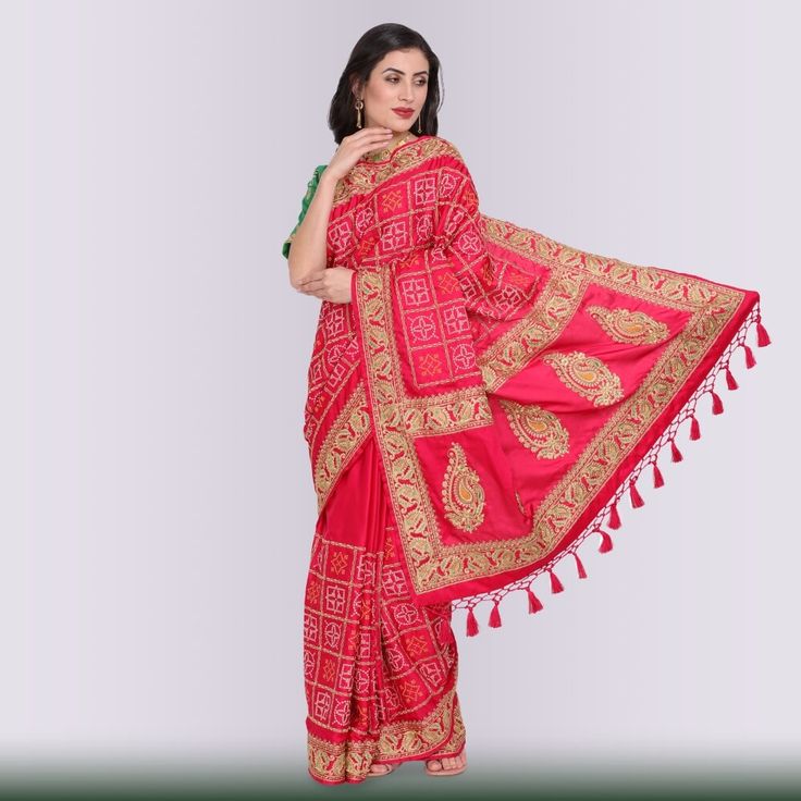 Introducing the Bandhani Print Gharchola in Red! This beautiful gharchola is made from pure gaji silk and features an exclusive bandhani print and gota work pallu. The bandhani print is traditional Indian tie-dyeing technique that is used to create intricate patterns on fabric. The result is a stunning piece of art that is perfect for any occasion. The gharchola is a traditional Indian garment that is worn by women of all ages. It is easy to wear and can be dressed up or down depending on the oc Festive Bandhani Print Traditional Wear For Puja, Semi-stitched Bandhani Traditional Wear For Puja, Red Bandhani Print Choli For Puja, Red Bandhani Print Lehenga For Traditional Ceremonies, Bohemian Bandhani Traditional Wear For Ceremonies, Red Bandhani Print Traditional Drape, Red Unstitched Traditional Wear With Bandhani Print, Red Bandhani Print Traditional Wear, Art Silk Bandhani Print Traditional Wear For Navratri