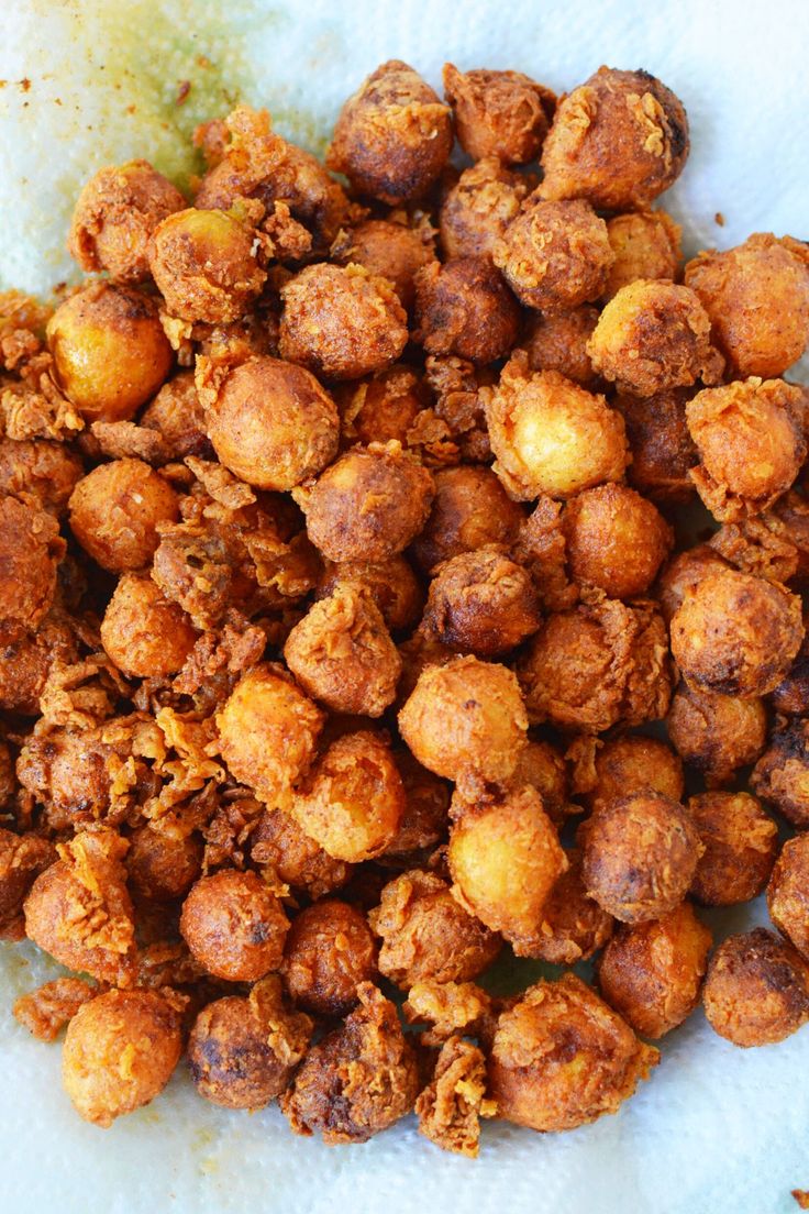 a pile of fried food sitting on top of a paper towel