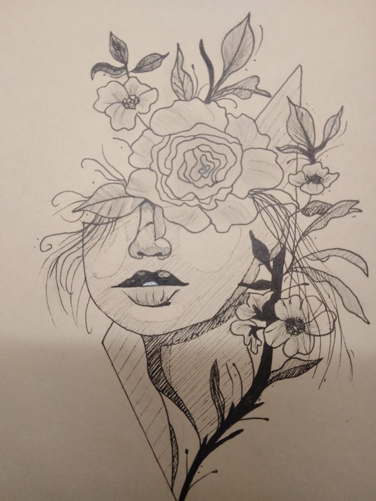 a drawing of a woman's face with flowers in her hair