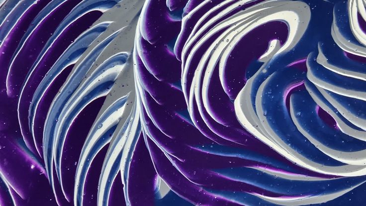 an abstract purple and white background with swirls in blue, gray, and white