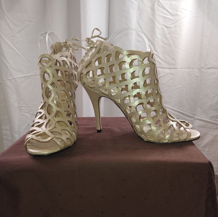 Klub Nico, Leather Vamp Lattice Booties, With Peep Toe & Lace Up, Tie Closure, At The Heel. Sold In Bhldn/Anthropologie. Tan Colored Metallic Leather Upper And Leather Sole. 4 1/2" Leather Wrapped Heel. Size 10. New With Shoe Bag. *Minor Scuffing Notes To Soles From Trying On, And From Being In My Closet! Handmade In Brazil. Party Booties With Wrapped Heel And Round Toe, Spring Party Ankle Strap Booties, Gold High Heel Summer Boots, Elegant Spring Fitted Booties, Party Booties With 4-inch Heel For Spring, Spring Party Booties With 4-inch Heel, Spring Formal Pointed Toe Booties, Fitted Closed Toe Spring Booties, Pointed Toe Party Booties For Spring