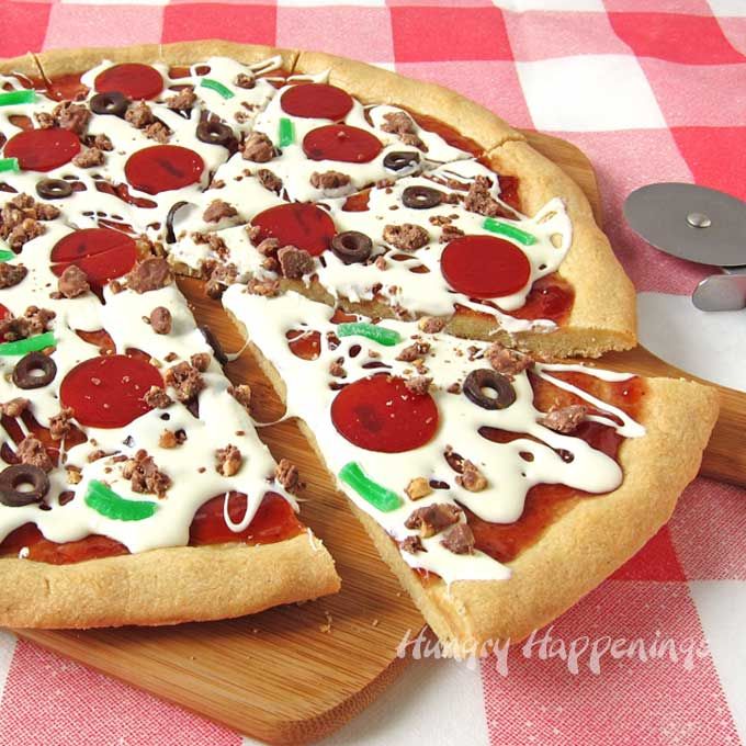 a pizza sitting on top of a wooden cutting board