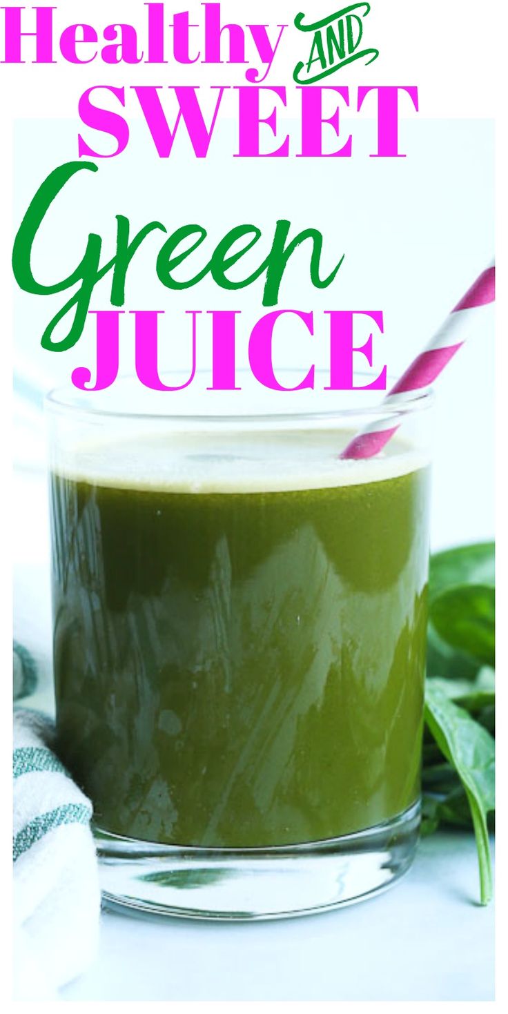 a green smoothie in a glass with a straw