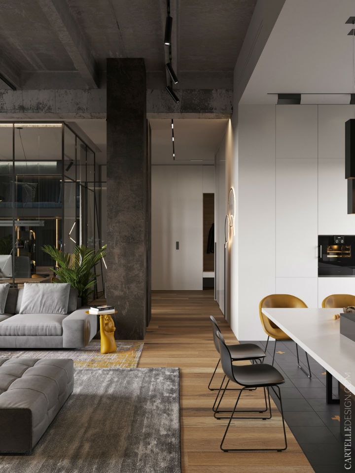 a living room filled with furniture next to a kitchen and dining area in front of a large window