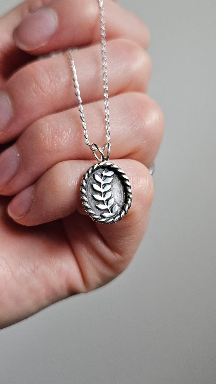 For all the nature lovers, a simple medallion for everyday wear. Layered with your other favorite pieces or worn on it's own, this necklace will surely bring a little bit of earth magic to your days. Handmade in sterling and fine silver. Polished to a high shine with patina to accentuate the details. Chain is also sterling silver and 16in long. As always, please reach out with any questions ~ Everyday Silver Nature-inspired Jewelry, Everyday Silver Necklace With Nature-inspired Style, Silver Nature-inspired Necklace For Everyday, Everyday Silver Nature-inspired Necklace, Everyday Nature-inspired Silver Necklace, Sterling Silver Everyday Necklace With Nature-inspired Style, Everyday Sterling Silver Nature-inspired Necklace, Nature-inspired Engraved Sterling Silver Necklace, Everyday Nature-inspired Sterling Silver Necklace