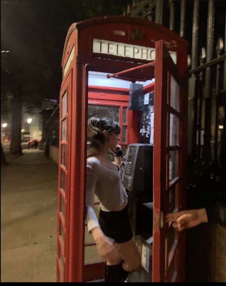 Girl in a telephone box in London at night time Payphone Photoshoot, Telephone Box Photoshoot, Phone Booth Photoshoot, Telephone Booth Photoshoot, London Phone Booth Poses, London Telephone Photo Ideas, London Telephone Booth Aesthetic, Telephone Call, London Red Phone Booth