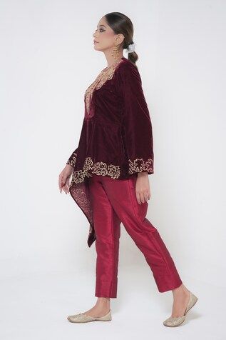 Maroon full sleeves cross cut tunic crafted in velvet with kashmiri bloom golden tilla embroidery detail. Paired with a straight silk pant. - Aza Fashions Long Sleeve Kaftan With Dabka Work For Reception, Eid Velvet Fitted Bandhgala, Fitted Velvet Bandhgala For Eid, Resham Embroidered Kaftan For Reception, Velvet Bandhgala For Eid Festivities, Long Sleeve Kaftan With Resham Embroidery For Reception, Long Sleeve Velvet Kurta With Dupatta, Velvet Long Sleeve Kurta For Party, Bollywood Velvet Sets With Long Sleeves