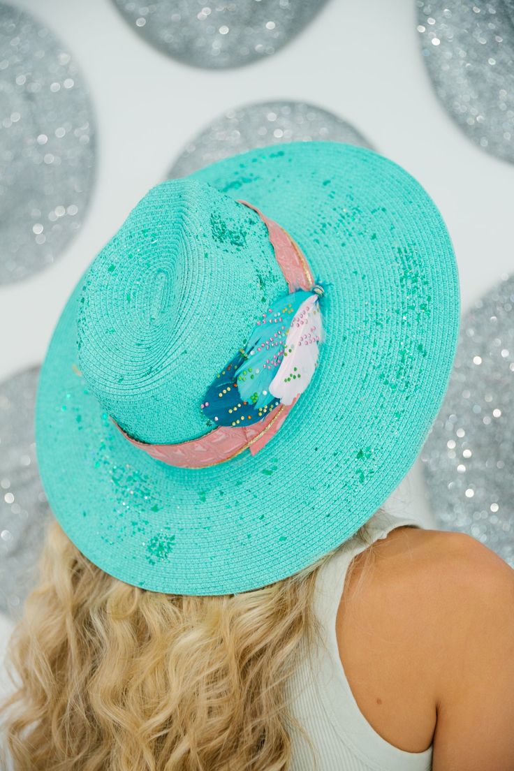 This JULEP SUN HAT will make you stand out in any crowd! Perfect for a day at the beach, this mint sun hat features a snake skin band, feathers, and a touch of glitter for a stylishly glamorous look. Keep the sun out of your eyes in style! This hat is one-of-a-kind, created by our owner Stephanie. This hat is ONE OF A KIND. To receive item quicker, expedited shipping is available at checkout. Glamorous Look, Rancher Hat, A Day At The Beach, Suns Out, A Snake, Day At The Beach, Sun Hat, Sun Hats, At The Beach