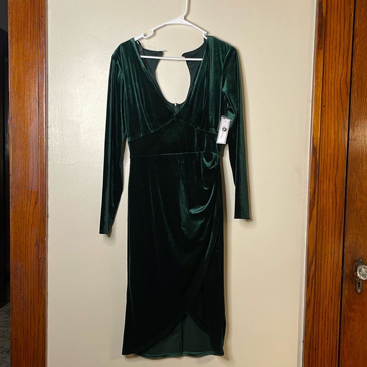 Bought For A Holiday Party And Never Wore It. The Button On The Back Popped Off, But The Extra Button Is Included And Looks Like An Easy Fix! Long Sleeves, Wide V-Neck, Midi-Length Dress. Size 8 And Has Very Flattering Stretch To It. 44” Length From Top Of Shoulder To Bottom Hem. Fitted Party Dress With Button Closure, Buttoned Midi Party Dress, Buttoned Midi Dress For Party, Party Dress With Buttons, Midi Length, Party Mini Dress With Buttons, Midi Length, Long Sleeve Party Dress With Button Closure, Fall Party Dress With Button Closure, Long Sleeve Midi Dress With Button Closure For Parties, Party Midi Dress With Button Closure And Long Sleeves