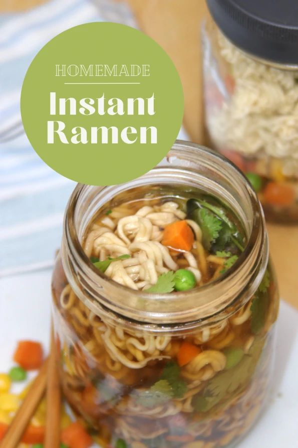 homemade instant ramen in a glass jar with chopsticks and carrots on the side