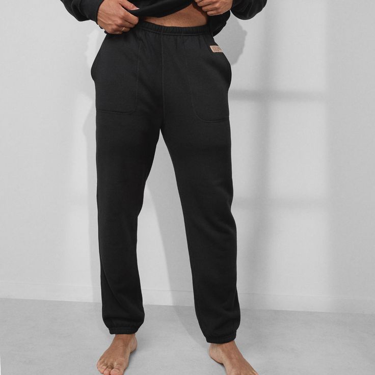 We took your favorite sweatpants and infused them with silk (the modern day turning water into wine). An innovative blend of breathable cotton and Washable Silk, the Silksweats™ Reversible Jogger come in a mid-rise, oversized fit – striking the balance of true comfort and effortless style. An interior of luxuriously cozy sherpa back, they’re 100% reversible for a two-in-one look. Elastic detailing at ankles for a put-together aesthetic, utilize the fully functional side seam pockets for everyday use (read: keep your hands free for those important coffee errands). Complete the look with the Silksweats™ Reversible Pocket Sweatshirt for a complete fit. Black Relaxed Fit Sweatpants For Relaxation, Casual Black Sweatpants For Relaxation, Black Casual Sweatpants, Relaxed Cotton Activewear For Relaxation, Cotton Athleisure Sweats For Leisure, Cotton Sweatpants For Relaxation, Cotton Sportswear Sweats For Loungewear, Black Relaxed Fit Pants For Relaxation, Black Relaxed Fit Casual Pants