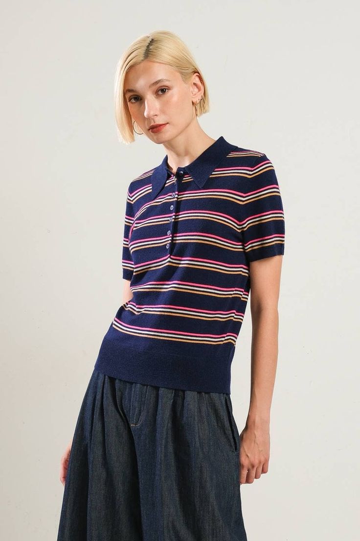 The Elsie Top will be a stylish and versatile addition to your wardrobe. This striped polo shirt features a classic collar, front button down placket, and short sleeves. 54% Polyester, 20% Acrylic, 20% Nylon, 6% Wool // Hand wash cold // Made in China Summer Striped Collared Polo Shirt, Striped Collared Polo Shirt For Summer, Striped Short Sleeve Polo Shirt For Summer, Striped Short Sleeve Top With Ribbed Collar, Spring Striped Polo Shirt, Striped Collared Top With Ribbed Collar, Classic Striped Polo Shirt With Collared Neckline, Retro Short Sleeve Polo Shirt With Striped Collar, Retro Striped Polo Shirt