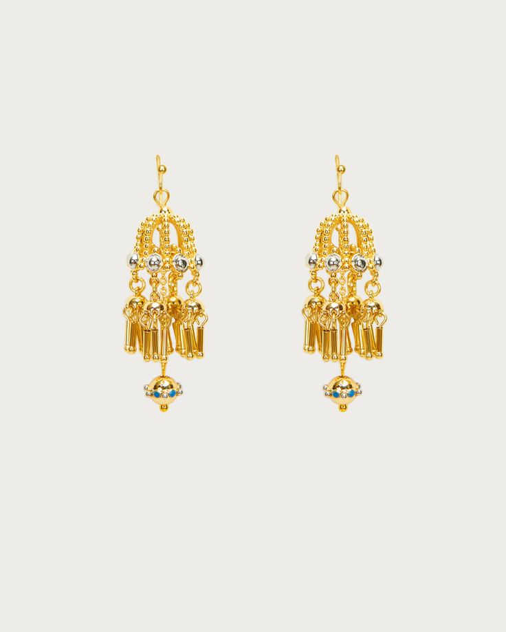 These retro drop earrings are reminiscent of traditional jhumka earrings, crafted like tiny cages holding mysterious little elves. Their delicate, intricate parts make crispy, subtle whispers by your ears. They catch the light as they sway with your every move, sprinkling shimmering sparkles on your skin. Hey, actually, wearing them makes you look as delightful as an elf! 🧚💛 Materials: 18k gold plated brass Measurement: 52mm/2.04" in length, 16mm/0.63" in width Festive 22k Gold Drop Earrings, 22k Gold Latkan Earrings For Celebrations, Traditional Gold-plated Danglers, Traditional Gold Plated Danglers, Festive 22k Gold Earrings, Gold Plug Earrings For Festive Celebration, Festive Gold Plug Earrings For Celebration, Festive Celebration Gold Plug Earrings, Traditional Gold-plated Earrings For Festivals