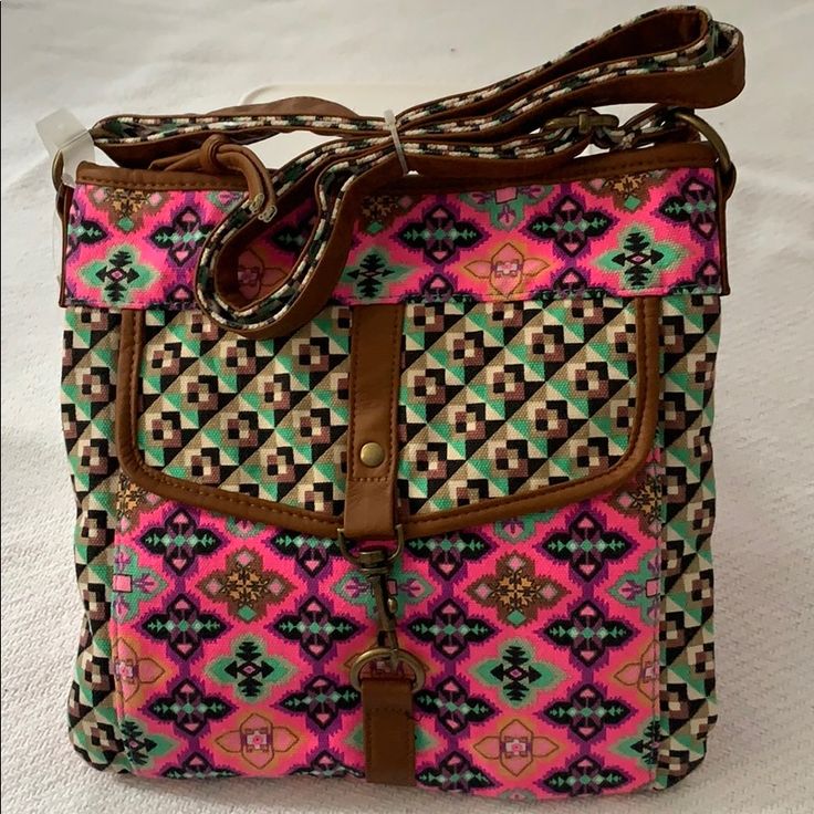 Beautiful Crossbody Bag. Colors: Brown, Pink, Green And Purple. Top Zipper Closure. Front, Pocket With Locker. Back, Zipper Pocket. 3 Pockets Inside And 1 Pocket With Zipper. Long Adjustable Strap. Product Dimensions (L X W X H) 10.50 X 10.50 X 2.00 Inches Casual Pink Satchel With Removable Pouch, Casual Pink Satchel For Summer, Trendy Pink Shoulder Bag With Adjustable Strap, Pink Casual Satchel For Summer, Pink Satchel With Mobile Phone Bag For Travel, Pink Crossbody Shoulder Bag, Trendy Pink Shoulder Bag For Travel, Casual Pink Bag With Adjustable Strap, Casual Pink Pouch Shoulder Bag