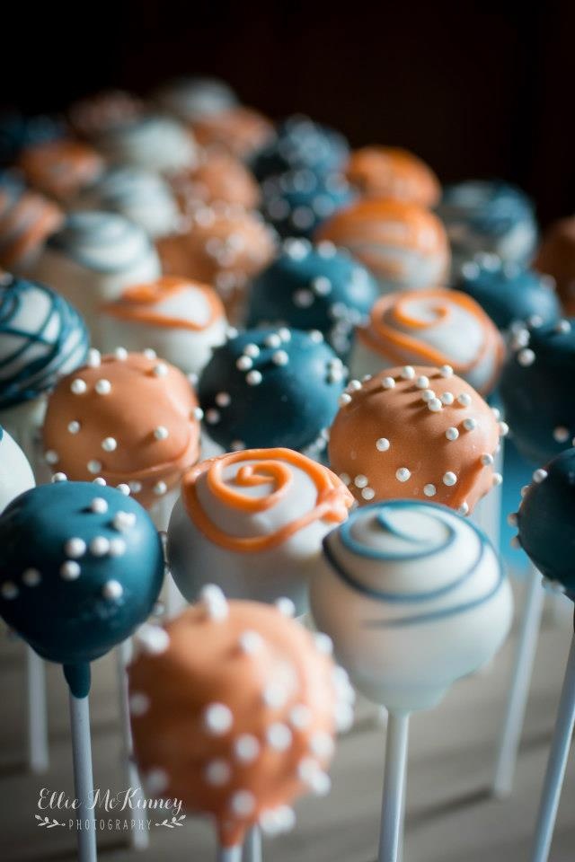 there are many cake pops on the stick