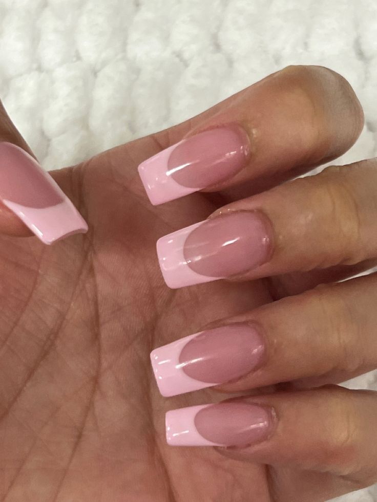 Pink french tip acrylic nails with white background. Pick French Tip Nails, White Nails Pink French Tip, Light Pink And White French Tip Nails, Powder Pink French Tip Nails, Pastel Pink Nails French Tip, Baby Pink Coffin Nail Ideas, Short White And Pink Acrylic Nails, Pastel Pink French Tips, Light Pink Acrylic French Tips