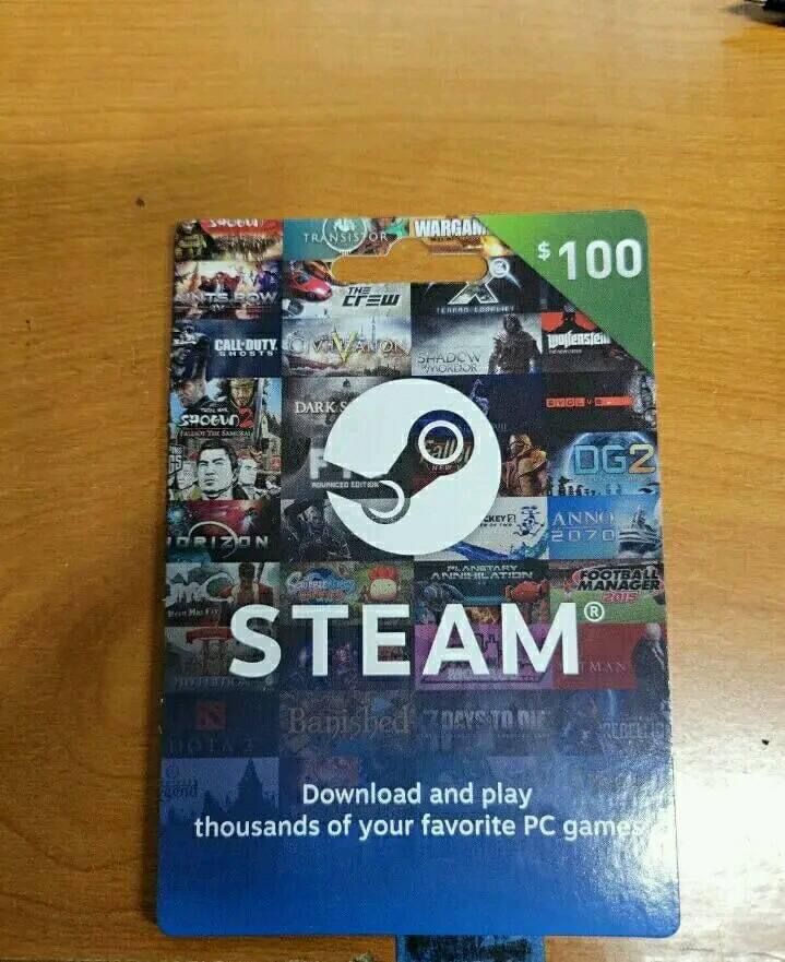 a card that is sitting on top of a wooden table with the word steam printed on it