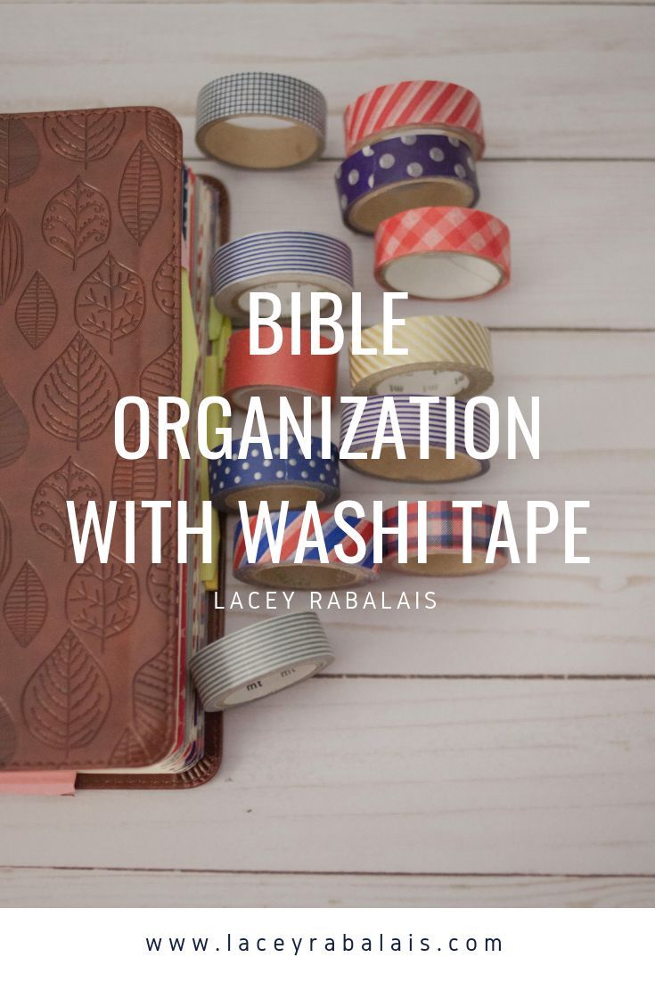 the bible organization with washi tape is shown on a white wooden surface, surrounded by other items