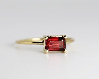 Red 14k Gold Stackable Rings As Gift, Classic Red Birthstone Stackable Rings, Red Minimalist Stackable Rings For Anniversary, Minimalist Red Stackable Rings For Anniversary, Minimalist Red Jewelry For Wedding, Red 14k Gold Stackable Rings For Anniversary, Classic Ruby Stackable Rings As A Gift, Classic Ruby Stackable Rings For Gift, Red Sapphire Ring In 14k Gold For Anniversary