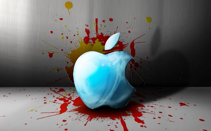 an apple logo with paint splatters on it