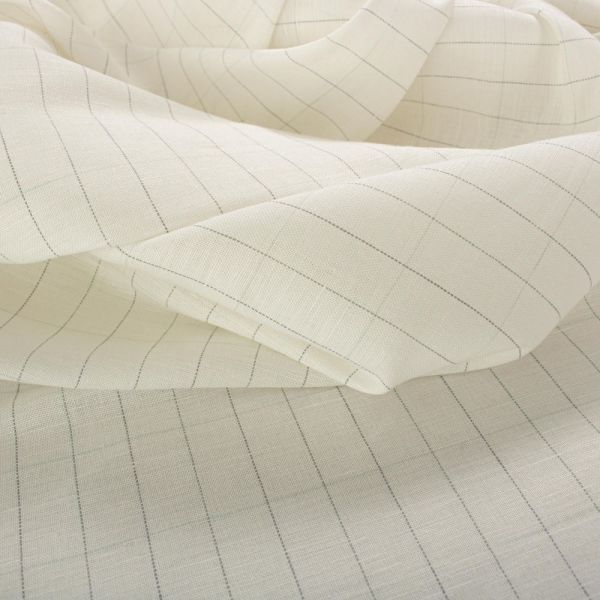 white and grey pinstripe fabric with lines on the side, closeup view