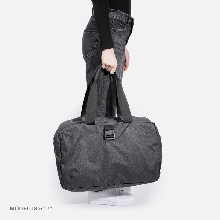 Go Duffel - Heathered Black — Aer | Modern gym bags, travel backpacks and laptop backpacks designed for city travel Multifunctional Nylon Luggage For On-the-go, Functional Packable Travel Accessories, Functional Everyday Packable Travel Accessories, Functional Foldable Travel Accessories For On-the-go, Multifunctional Everyday Nylon Travel Accessories, Packable Functional Travel Accessories For Everyday, Functional Foldable Travel Bag For Daily Use, Functional Foldable Travel Accessories For Daily Use, Foldable Functional Travel Accessories