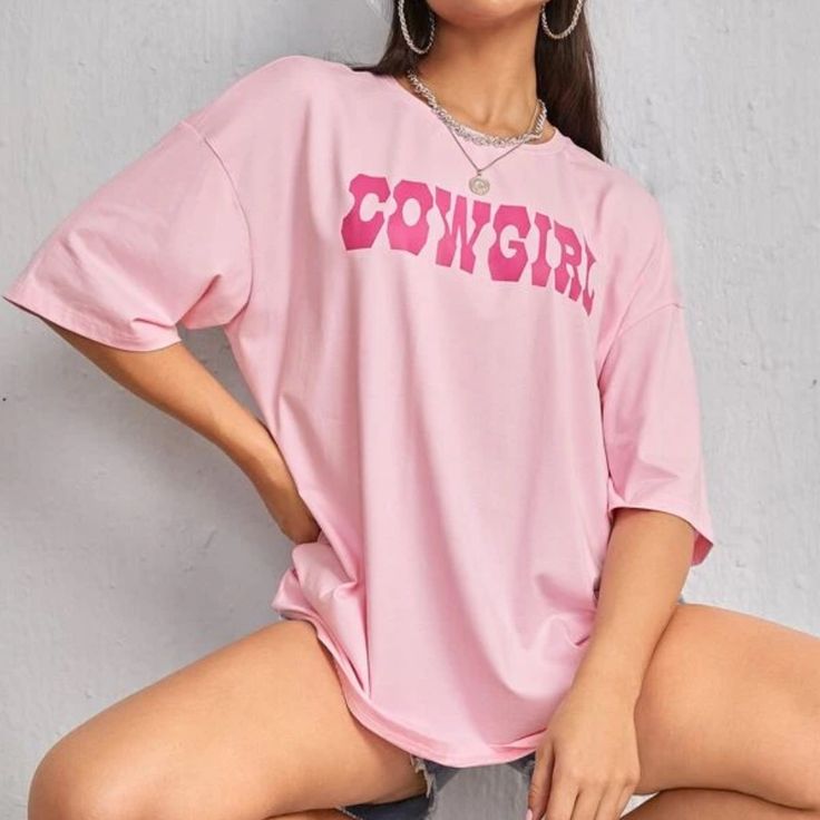 Oversized, Never Worn Oversized Pink Graphic Print T-shirt, Oversized Summer T-shirt, Cute Oversized T-shirt For Spring, Oversized Pink Top With Text Print, Oversized Pink Slogan Top, Trendy Oversized Slogan T-shirt, Oversized Cute Spring T-shirt, Trendy Oversized Slogan Top, Trendy Oversized Letter Print T-shirt